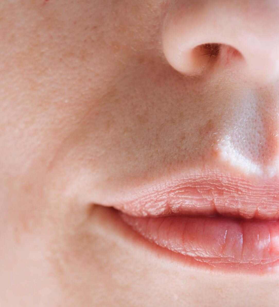 closeup of womans nose and mouth